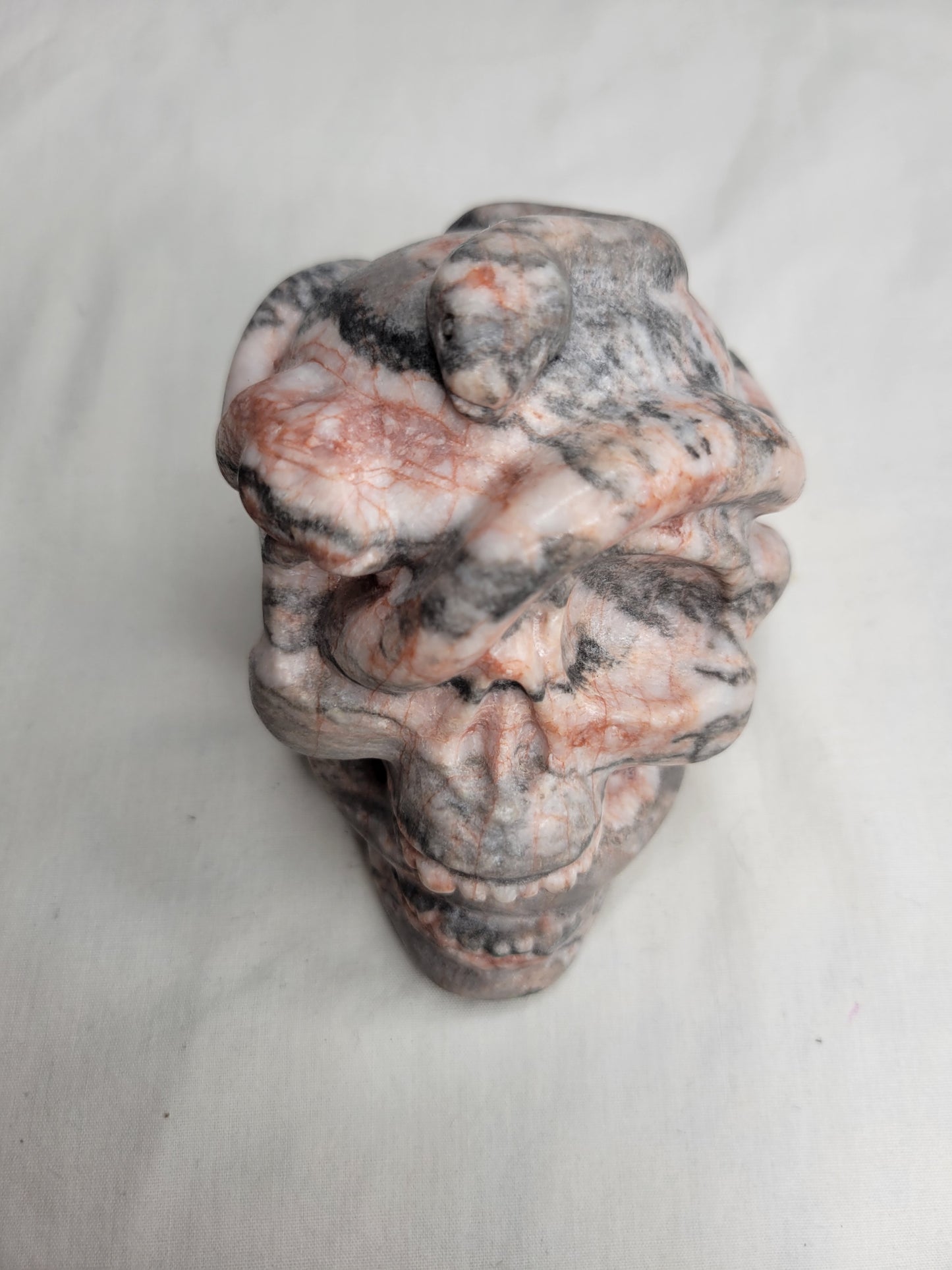 Pink Zebra Jasper Snake Skull